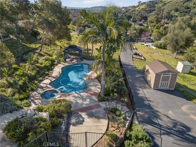 Set on 1.33 acres along a private road in a small community on Pala Mesa Resort in California - for sale on GolfHomes.com, golf home, golf lot