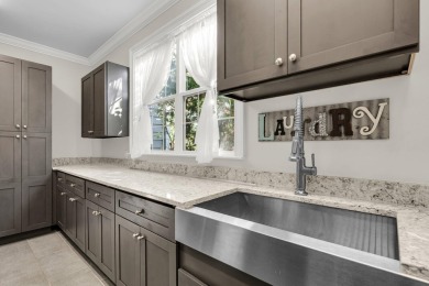 Welcome to 2720 Oak Manor Drive, a refined Southern sanctuary on Dunes West Golf Club in South Carolina - for sale on GolfHomes.com, golf home, golf lot