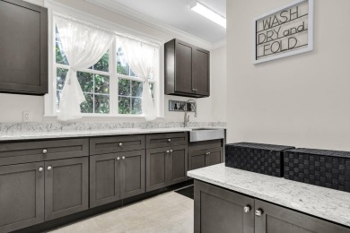 Welcome to 2720 Oak Manor Drive, a refined Southern sanctuary on Dunes West Golf Club in South Carolina - for sale on GolfHomes.com, golf home, golf lot