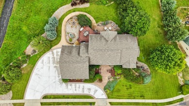 Beautiful custom built, executive home in coveted Enchanted on Arrowhead Country Club in South Dakota - for sale on GolfHomes.com, golf home, golf lot