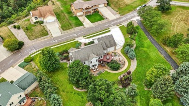 Beautiful custom built, executive home in coveted Enchanted on Arrowhead Country Club in South Dakota - for sale on GolfHomes.com, golf home, golf lot