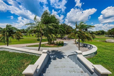 One or more photo(s) has been virtually staged. Nestled within on The Eagles Golf Course and Club in Florida - for sale on GolfHomes.com, golf home, golf lot