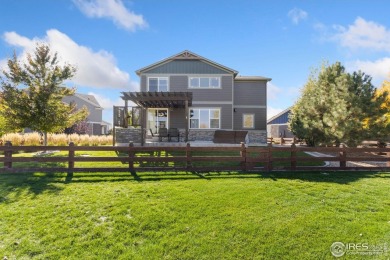 Live the Water Valley lifestyle in this gorgeous 4-bed, 4-bath on Pelican Lakes Golf and Country Club in Colorado - for sale on GolfHomes.com, golf home, golf lot
