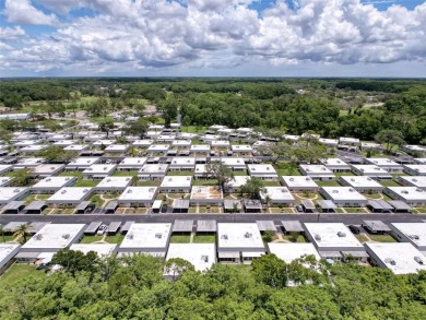 Popular 55+ gated Community, offers resort style living with no on Summertree Golf Course in Florida - for sale on GolfHomes.com, golf home, golf lot