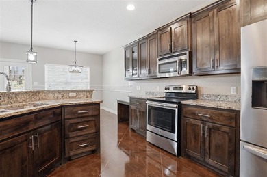 Wow...........MOVE IN READY UPDATED 4 3 2 on a large .39 acre on Pecan Plantation Country Club in Texas - for sale on GolfHomes.com, golf home, golf lot