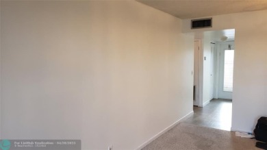 Super view from this cozy one bedroom waiting for your personal on Sunrise Lakes Phase IV Golf Course in Florida - for sale on GolfHomes.com, golf home, golf lot