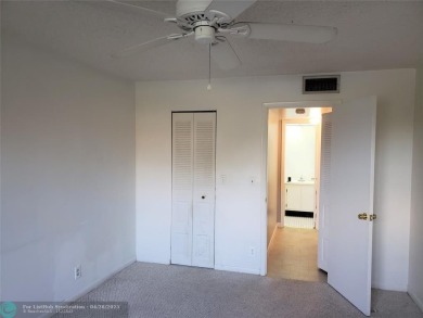Super view from this cozy one bedroom waiting for your personal on Sunrise Lakes Phase IV Golf Course in Florida - for sale on GolfHomes.com, golf home, golf lot