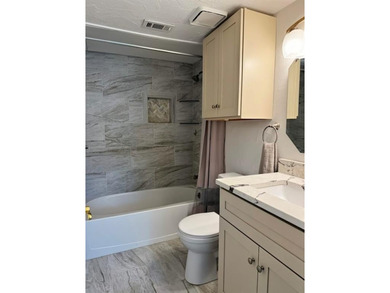 Highly upgraded unit with an ensuite bath for each bedroom plus on Stevens Park Golf Course in Texas - for sale on GolfHomes.com, golf home, golf lot