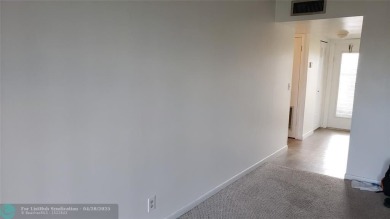 Super view from this cozy one bedroom waiting for your personal on Sunrise Lakes Phase IV Golf Course in Florida - for sale on GolfHomes.com, golf home, golf lot