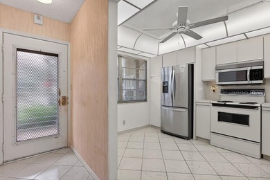 ASSOC REQUIRES 15% DOWN & 1 OCCUP on Wynmoor Golf Course in Florida - for sale on GolfHomes.com, golf home, golf lot