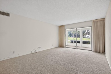 ASSOC REQUIRES 15% DOWN & 1 OCCUP 55+ VACANT/CLICK ON SHOWING on Wynmoor Golf Course in Florida - for sale on GolfHomes.com, golf home, golf lot