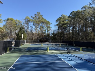 Welcome to refined coastal living inside the gates of Fairfield on Harbour Point Golf Club in North Carolina - for sale on GolfHomes.com, golf home, golf lot