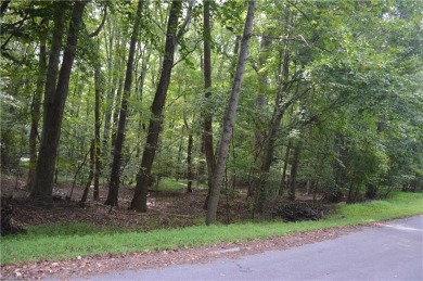 This beautiful private lot is wooded in a coveted subdivision on Bryan Park Golf Course in North Carolina - for sale on GolfHomes.com, golf home, golf lot