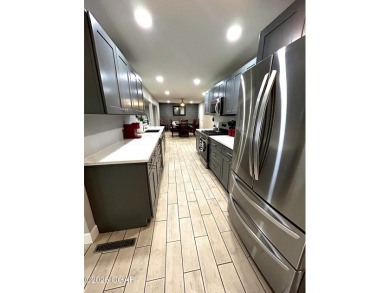 Completely remodeled golf course home offering 2,147 sq. ft. of on Baxter Country Club in Kansas - for sale on GolfHomes.com, golf home, golf lot