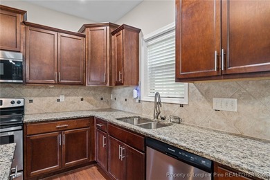 This 4-bedroom, 2.5-bath home is located in the gated on Anderson Creek Golf Club in North Carolina - for sale on GolfHomes.com, golf home, golf lot