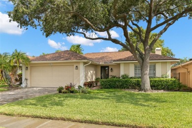 Welcome home!   Situated in the well-established neighborhood of on Feather Sound Country Club in Florida - for sale on GolfHomes.com, golf home, golf lot