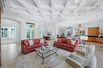 Immerse yourself in the ultimate expression of luxury living at on Shadow Wood Country Club in Florida - for sale on GolfHomes.com, golf home, golf lot