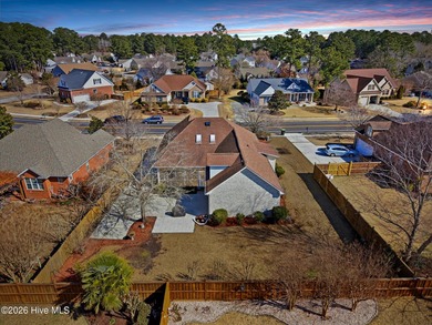 Welcome to 1134 Grandiflora Drive, a low-maintenance brick home on Magnolia Greens Golf Plantation in North Carolina - for sale on GolfHomes.com, golf home, golf lot