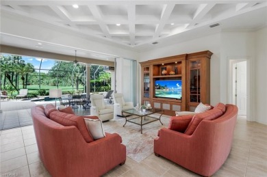 Immerse yourself in the ultimate expression of luxury living at on Shadow Wood Country Club in Florida - for sale on GolfHomes.com, golf home, golf lot