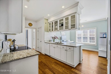 Welcome to 1134 Grandiflora Drive, a low-maintenance brick home on Magnolia Greens Golf Plantation in North Carolina - for sale on GolfHomes.com, golf home, golf lot