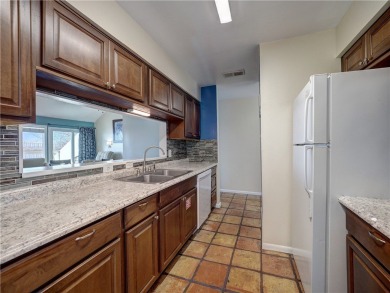 Experience waterfront living in this 3-bedroom, 2-bathroom condo on Padre Isles Golf Course in Texas - for sale on GolfHomes.com, golf home, golf lot