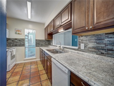 Experience waterfront living in this 3-bedroom, 2-bathroom condo on Padre Isles Golf Course in Texas - for sale on GolfHomes.com, golf home, golf lot