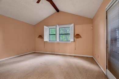 Discover serenity in this custom Stone home situated on over 1.2 on Denison Country Club in Texas - for sale on GolfHomes.com, golf home, golf lot