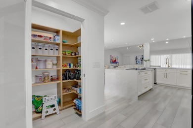 39 Edinburgh Drive on PGA National Golf Club in Florida - for sale on GolfHomes.com, golf home, golf lot