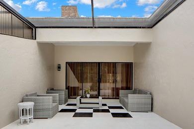 39 Edinburgh Drive on PGA National Golf Club in Florida - for sale on GolfHomes.com, golf home, golf lot