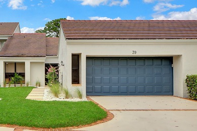 39 Edinburgh Drive on PGA National Golf Club in Florida - for sale on GolfHomes.com, golf home, golf lot