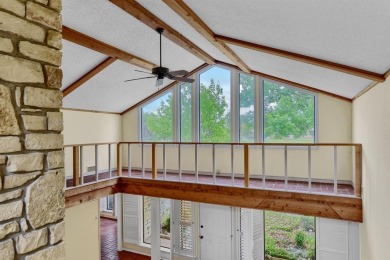 Discover serenity in this custom Stone home situated on over 1.2 on Denison Country Club in Texas - for sale on GolfHomes.com, golf home, golf lot