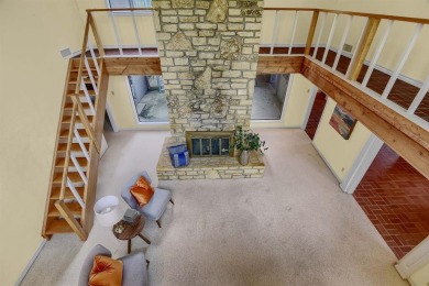 Discover serenity in this custom Stone home situated on over 1.2 on Denison Country Club in Texas - for sale on GolfHomes.com, golf home, golf lot