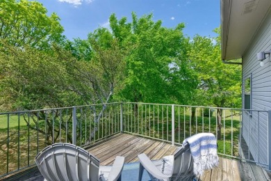 Discover serenity in this custom Stone home situated on over 1.2 on Denison Country Club in Texas - for sale on GolfHomes.com, golf home, golf lot