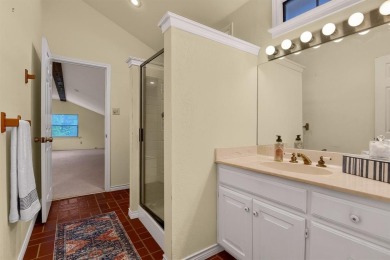 Discover serenity in this custom Stone home situated on over 1.2 on Denison Country Club in Texas - for sale on GolfHomes.com, golf home, golf lot