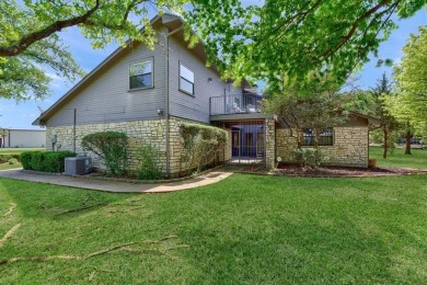 Discover serenity in this custom Stone home situated on over 1.2 on Denison Country Club in Texas - for sale on GolfHomes.com, golf home, golf lot