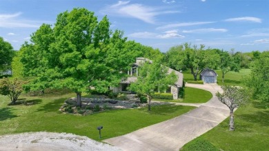 Discover serenity in this custom Stone home situated on over 1.2 on Denison Country Club in Texas - for sale on GolfHomes.com, golf home, golf lot