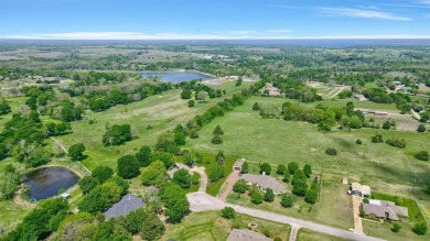 Discover serenity in this custom Stone home situated on over 1.2 on Denison Country Club in Texas - for sale on GolfHomes.com, golf home, golf lot