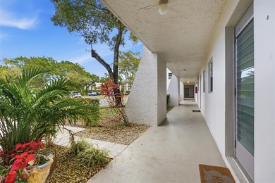 Discover this beautifully updated first-floor 2/2 condo offering on Pine Island Ridge Country Club in Florida - for sale on GolfHomes.com, golf home, golf lot
