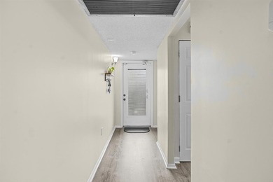 Discover this beautifully updated first-floor 2/2 condo offering on Pine Island Ridge Country Club in Florida - for sale on GolfHomes.com, golf home, golf lot