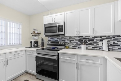Discover this beautifully updated first-floor 2/2 condo offering on Pine Island Ridge Country Club in Florida - for sale on GolfHomes.com, golf home, golf lot