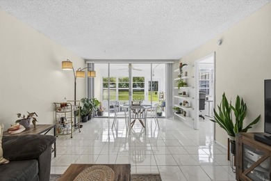 Discover this beautifully updated first-floor 2/2 condo offering on Pine Island Ridge Country Club in Florida - for sale on GolfHomes.com, golf home, golf lot
