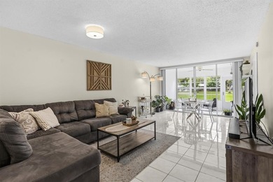 Discover this beautifully updated first-floor 2/2 condo offering on Pine Island Ridge Country Club in Florida - for sale on GolfHomes.com, golf home, golf lot