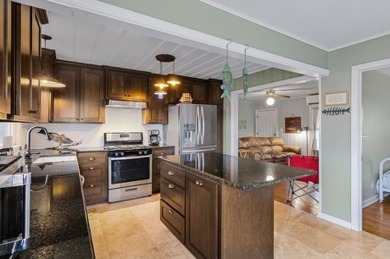 Ride your golf cart to dining, the beach, and downtown from this on Rockport Country Club in Texas - for sale on GolfHomes.com, golf home, golf lot