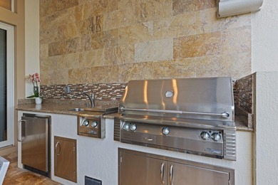 Situated within the gated enclave of Azura, 17334 Pavaroso on  in Florida - for sale on GolfHomes.com, golf home, golf lot