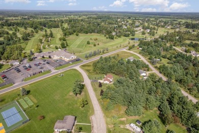 BACK ON THE MARKET! Welcome to this charming Sugar Springs home on Sugar Springs Country Club in Michigan - for sale on GolfHomes.com, golf home, golf lot