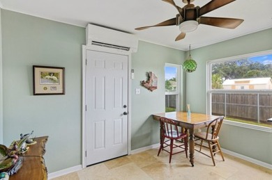 Ride your golf cart to dining, the beach, and downtown from this on Rockport Country Club in Texas - for sale on GolfHomes.com, golf home, golf lot