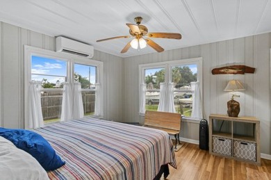 Ride your golf cart to dining, the beach, and downtown from this on Rockport Country Club in Texas - for sale on GolfHomes.com, golf home, golf lot