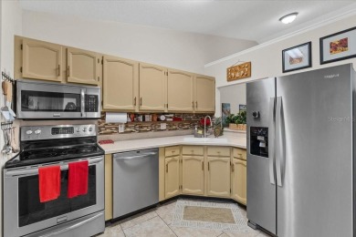 The best of both worlds, this sweet villa is easy to maintain on Sandpiper Golf Club in Florida - for sale on GolfHomes.com, golf home, golf lot