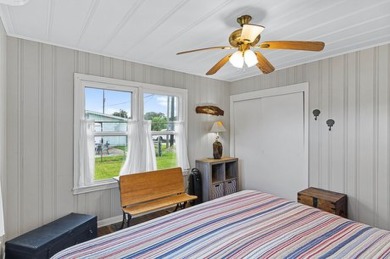 Ride your golf cart to dining, the beach, and downtown from this on Rockport Country Club in Texas - for sale on GolfHomes.com, golf home, golf lot