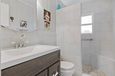 Ride your golf cart to dining, the beach, and downtown from this on Rockport Country Club in Texas - for sale on GolfHomes.com, golf home, golf lot